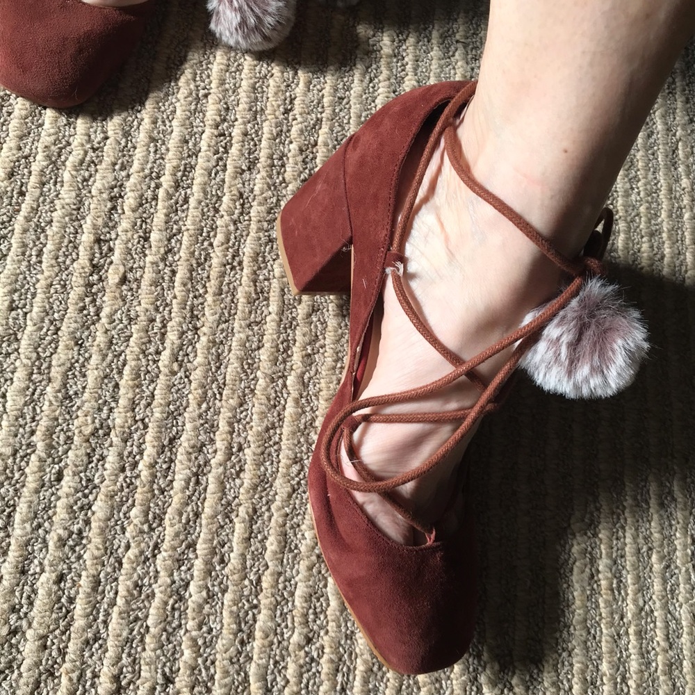 Suede ankle tie shoes with pompoms. Super comfortable! And Flattering